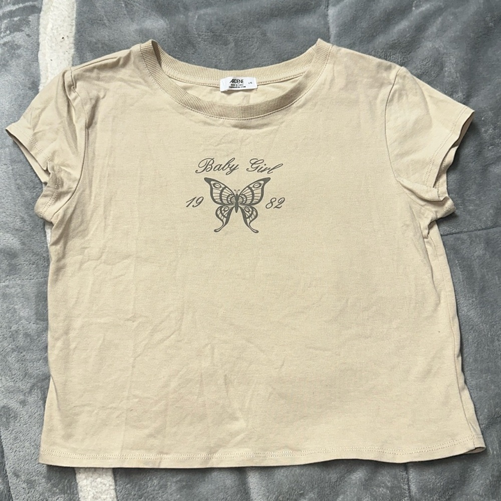 Ardene size large crop tan tee. With butterfly design.